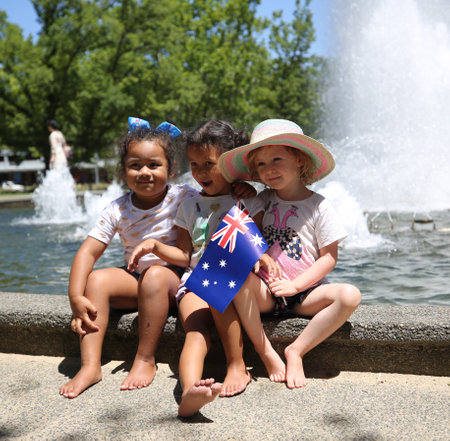 MELBOURNE, AUSTRALIA - JANUARY 26, 2019: Unidentified kids celebrate Australia on Australia Day next to Walker Fountain in Melbourneのeditorial素材