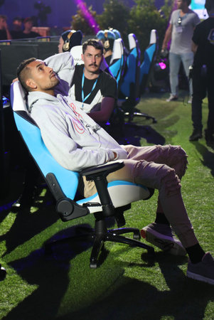 MELBOURNE, AUSTRALIA - JANUARY 27, 2019: Professional tennis player Nick Kyrgios joints hundreds Fortnite gamers to compete during Fortnite Summer Smash at Australian Open 2019 in Melbourneのeditorial素材