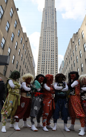 NEW YORK - MARCH 7, 2019: Unidentified Japanese tourists in national dress posing for pictures at...