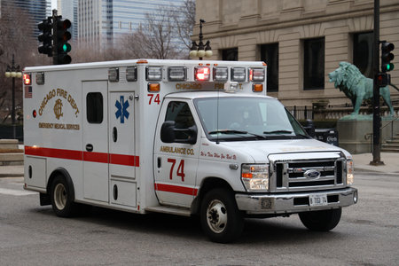 CHICAGO, ILLINOIS - MARCH 12, 2019:  Chicago Fire Department Ambulance in Downtown. The Chicago Fire Department (CFD) provides fire suppression and emergency medical services to the city of Chicagoのeditorial素材