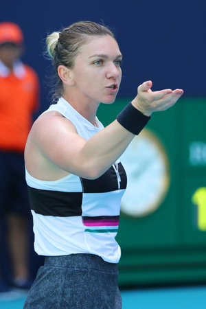 MIAMI GARDENS, FLORIDA - MARCH 27, 2019: Grand Slam Champion Simona Halep of Romania in action during her quarter-final match at 2019 Miami Open at the Hard Rock Stadium in Miami Gardens, Floridaのeditorial素材