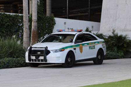 MIAMI, FLORIDA - MARCH 27, 2019: Miami - Dade police department car in South Miami. Police Department serving Miami-Dade County and has more than 3 thousand officersのeditorial素材