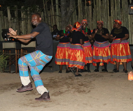 HAZYVIEW, SOUTH AFRICA - OCTOBER 1, 2018: Local dancers perform for tourists in Singita lodge located in Sabi Sands Game Reserve, South Africaのeditorial素材