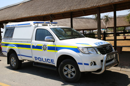 MPUMALANGA, SOUTH AFRICA - OCTOBER 2, 2018: South African Police Service provides security in Kruger Mpumalanga International Airport, South Africa.のeditorial素材