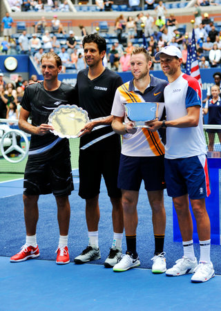 NEW YORK - SEPTEMBER 7, 2018: Lukasz Kubot of Poland (L), Marcelo Melo of Brazil with 2018 US Open men' doubles champions Jack Sock and Mike Bryan of United States during trophy presentationのeditorial素材