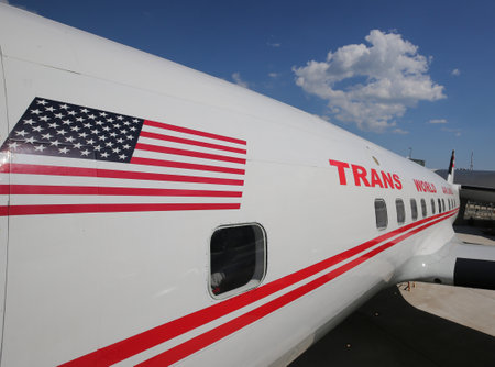 NEW YORK- MAY 16, 2019: TWA Hotel's 1958 Lockheed Constellation airplane in front of the landmark TWA Flight Center building designed by Eero Saarinen at the JFK Airport in New Yorkのeditorial素材