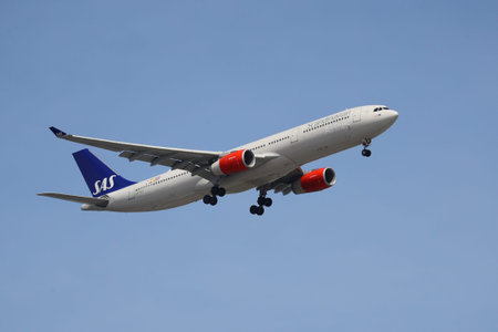 NEWARK, NEW JERSEY - MAY 26, 2019: SAS Scandinavian Airlines Airbus A330-300 descending for landing...