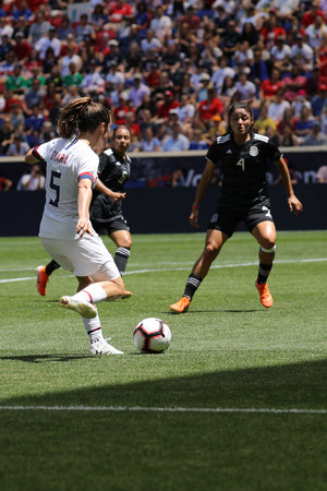HARRISON, NJ - MAY 26, 2019: U.S. Women's National Soccer Team defender Kelley O'Hara #5 in action during friendly game against Mexico as preparation for 2019 Women's World Cup in Harrison, NJのeditorial素材