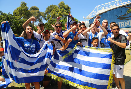 MELBOURNE, AUSTRALIA - JANUARY 22, 2019: Greek tennis fans support tennis player Stefanos Tsitsipas during his quarter final match at Australian Open 2019 in Melbourne Parkのeditorial素材