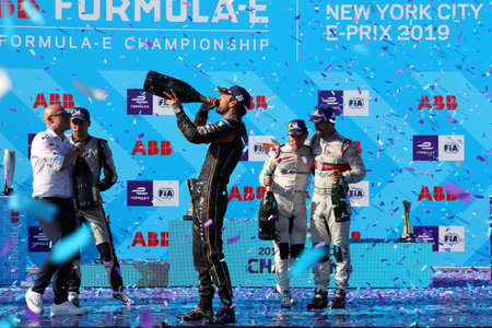 NEW YORK - JULY 14, 2019: Jean-Eric Vergne (FRA) of DS Techeetah Team celebrates with champagne his historic two-time FIA Formula E World Championship title during 2019 New York City E-Prix in Brooklynのeditorial素材