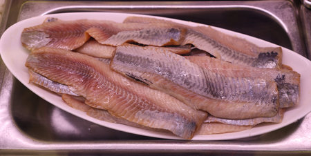 Pickled herring in deli store