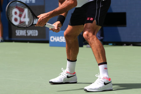 NEW YORK - SEPTEMBER 1, 2019: 20-time Grand Slam champion Roger Federer of Switzerland wears custom Nike tennis shoes during the 2019 US Open round of 16 match at National Tennis Center in New Yorkのeditorial素材