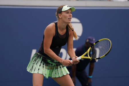 NEW YORK - AUGUST 27, 2019: Grand Slam Champion Caroline Wozniacki of Denmark in action during her 2019 US Open first round match at Billie Jean King National Tennis Centerのeditorial素材