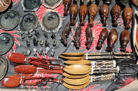 HWANGE, ZIMBABWE - OCTOBER 3, 2018: Local souvenirs on display at the street market near Victoria Falls National Park entrance on the Zimbabwe sideのeditorial素材