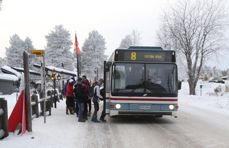 ROVANIEMI, FINLAND - FEBRUARY 19, 2017: Public bus between Santa Claus Village and Rovaniemi in the Lapland region of Finland. It is an amusement park opened in 1985のeditorial素材