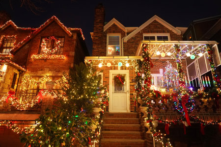 BROOKLYN, NEW YORK - DECEMBER 19, 2019: Christmas house decoration lights display in the suburban Brooklyn neighborhood of Dyker Heightsのeditorial素材