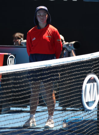 MELBOURNE, AUSTRALIA - JANUARY 24, 2019: Ball girl in action during match at 2019 Australian Open in Melbourne Parkのeditorial素材