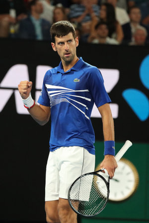 MELBOURNE, AUSTRALIA - JANUARY 27, 2019: 14 time Grand Slam Champion Novak Djokovic of Serbia in action during his final match against Rafael Nadal at 2019 Australian Open in Melbourne Parkのeditorial素材