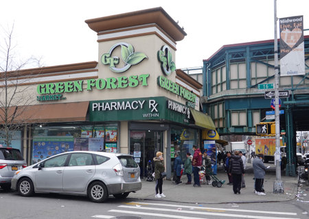 BROOKLYN, NEW YORK - MARCH 20, 2020: Line outside of grocery store after  public health guidelines on social distancing to flat curve of  Coronavirus (COVID-19) in Brooklyn, New York.のeditorial素材