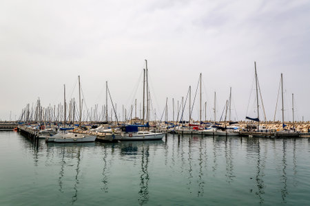 ASHKELON, ISRAEL - MAY 1, 2017: Sailing yachts in Ashkelon Marina, Israel. It is a coastal city in the Southern District of Israel on the Mediterranean coast, 50 kilometres (31 mi) south of Tel Avivのeditorial素材
