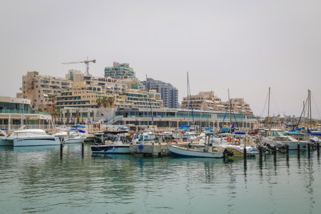 ASHKELON, ISRAEL - MAY 1, 2017: Sailing yachts in Ashkelon Marina, Israel. It is a coastal city in the Southern District of Israel on the Mediterranean coast, 50 kilometres (31 mi) south of Tel Avivのeditorial素材