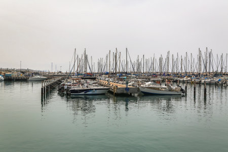 ASHKELON, ISRAEL - MAY 1, 2017: Sailing yachts in Ashkelon Marina, Israel. It is a coastal city in the Southern District of Israel on the Mediterranean coast, 50 kilometres (31 mi) south of Tel Avivのeditorial素材