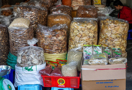 HANOI, VIETNAM - OCTOBER 28, 2019: Local goods for sale at Old Quarter morning market in Hanoi, Vietnamのeditorial素材