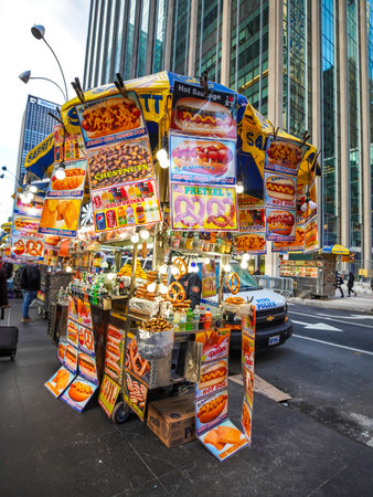 NEW YORK - DECEMBER 5, 2019: Street food vendor cart in Manhattan. There are about 4,000 mobile food vendors licensed by the cityのeditorial素材