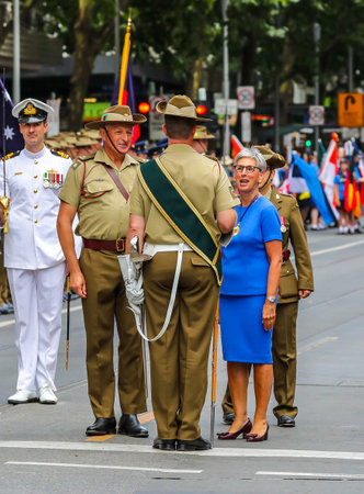 MELBOURNE, AUSTRALIA - JANUARY 26, 2019: The Governor of Victoria the Hon. Linda Dessau AC inspecting the military guard during 2019 Australia Day Parade in Melbourneのeditorial素材