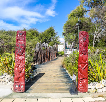 ROTORUA, NEW ZEALAND - FEBRUARY 2, 2019: Maori carvings at the Hell's Gate Geothermal Reserve and Mud Spa in Rotorua, New Zealandのeditorial素材