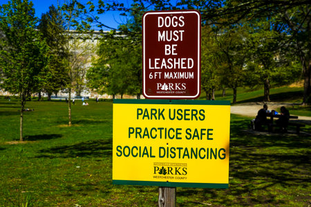 Sign by the Westchester County Parks Department indicates practice safe social distancing in Croton...