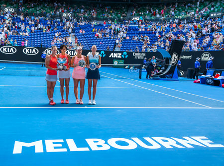 MELBOURNE, AUSTRALIA - JANUARY 25, 2019: 2019 Australian Open champions Samantha Stosur AUS (L) , Zhang Shuai CHN and finalists Timea Babos HUN, Kristina Mladenovic FRA during trophy presentationのeditorial素材