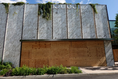 MANHASSET, NEW YORK - JUNE 7, 2020: Gucci store boards up as a precaution to prevent looting of the...