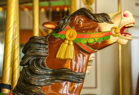 Horses on a traditional fairground B&B carousel at historic Coney Island Boardwalk in Brooklynの写真素材
