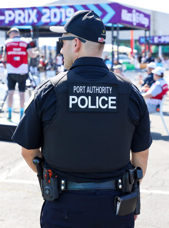 BROOKLYN, NEW YORK - JULY 13, 2019: Port Authority Police officer provides security during public...