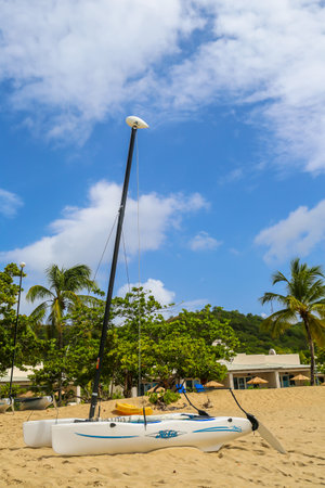 GRAND ANSE BEACH, GRENADA - JUNE 10, 2017: Hobie Cat catamaran at Grand Anse Beach in Grenadaのeditorial素材