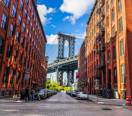 BROOKLYN, NEW YORK - MAY 4, 2020: Iconic Manhattan Bridge and Empire State Building view from...