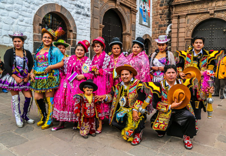 CUSCO, PERU - OCTOBER 4, 2016: Unidentified participants in traditional clothes celebrate religious festivity in front of the Cathedral (Convent) of Santo Domingo in Cusco, Peruのeditorial素材