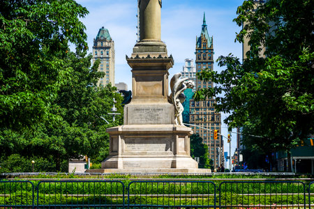 Statue of Christopher Columbus in New York City. NYPD guards Columbus Circle in Manhattan as this statue have been targeted by protestersのeditorial素材