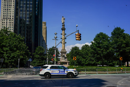 Statue of Christopher Columbus in New York City. NYPD guards Columbus Circle in Manhattan as this statue have been targeted by protestersのeditorial素材