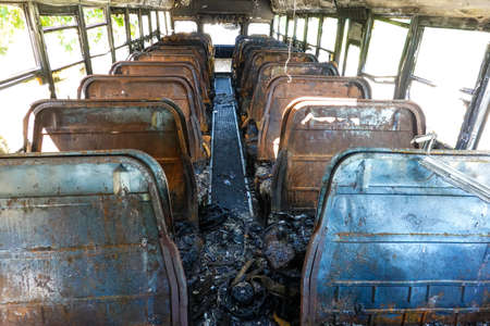 Burned school bus at Shore Parkway in Brooklyn, New Yorkの写真素材
