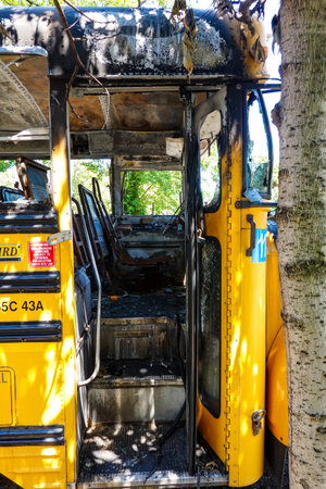 BROOKLYN, NEW YORK - JULY 28, 2020: Burned school bus at Shore Parkway in Brooklyn, New Yorkのeditorial素材