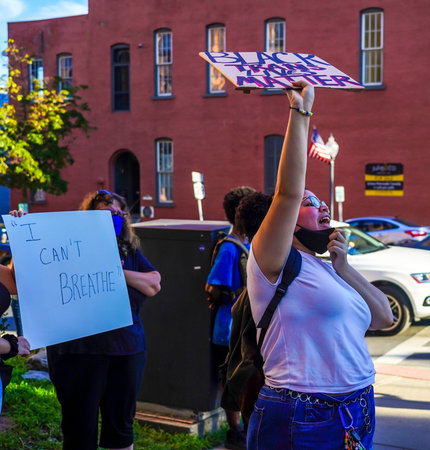 SARATOGA SPRINGS, NEW YORK  - AUGUST 3, 2020: Black Lives Matter and Defund Police  Protesters in...