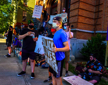 SARATOGA SPRINGS, NEW YORK  - AUGUST 3, 2020: Black Lives Matter and Defund Police  Protesters in...