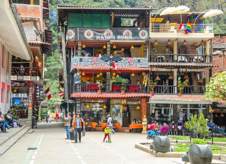 AGUAS CALIENTES, PERU - OCTOBER 3, 2016:  Machu Picchu pueblo village scene in Peru. Machu Picchu is both a cultural and natural UNESCO World Heritage Site from 1983のeditorial素材