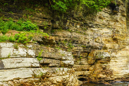 Adventurous rope bridge over Ausable River seen at Ausable Chasm in Upstate New York. The gorge is about two miles 3.2 km long and is a tourist attraction in the Adirondacks region of Upstate New Yorkの写真素材