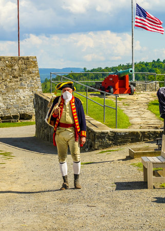 TICONDEROGA, NEW YORK - AUGUST 23, 2020: Reenactor at  the historic  Fort Ticonderoga in Upstate New...