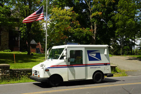 AUSABLE CHASM, NEW YORK - AUGUST 22, 2020: United States Postal Service truck in upstate New Yorkのeditorial素材