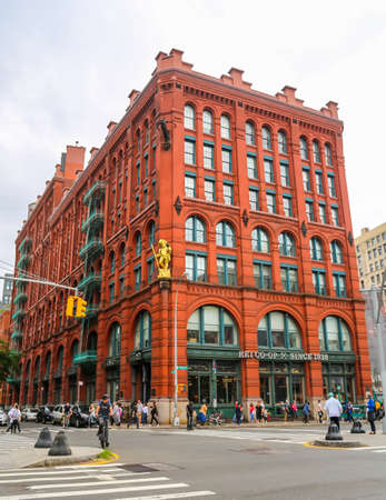 NEW YORK - JULY 29, 2017: Historic Puck Building with gilded statue of Shakespeare's character Puck in Manhattanのeditorial素材
