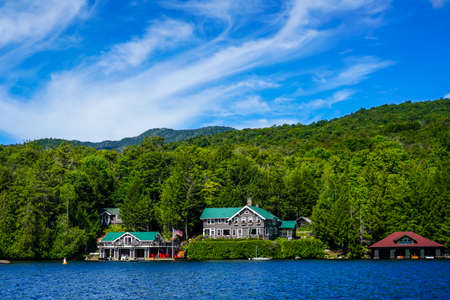 LAKE PLACID, NEW YORK - AUGUST 20, 2020: Luxury boathouse on Lake Placid in New York State's Adirondack Mountainsのeditorial素材